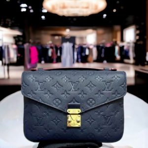 LOUIS VUITTON Metis Pochette Empreint Leather Crossbody Bag