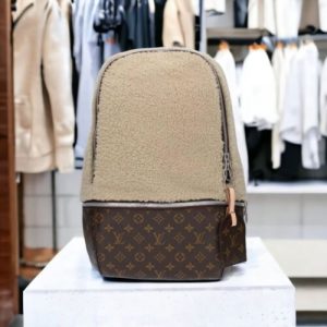 LOUIS VUITTON Marc Newson Travel Monogram Backpack